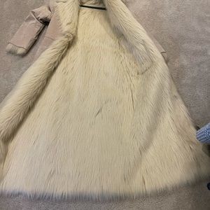 Only worn a few times!Closes with single hook.Suede with faux fur inside.